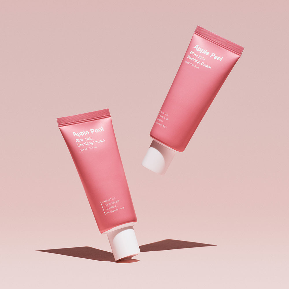 SUNGBOON EDITOR Apple Peel Glow Skin Soothing Cream 50ml tubes against a pink background.