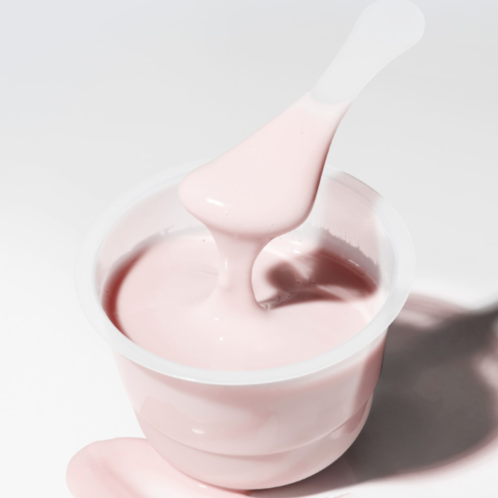 SUNGBOON EDITOR Boosting Modeling Pack Apple Peel Glow Soothing pink skincare mask in container with applicator