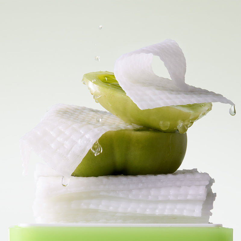SUNGBOON EDITOR Green Tomato NMN Pore Peeling Jumbo Pad 60 Pads with green tomato and texture in focus.