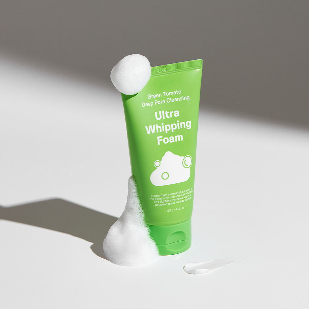 SUNGBOON EDITOR Green Tomato Pore Whipping Foam 120g tube with foam on a white background