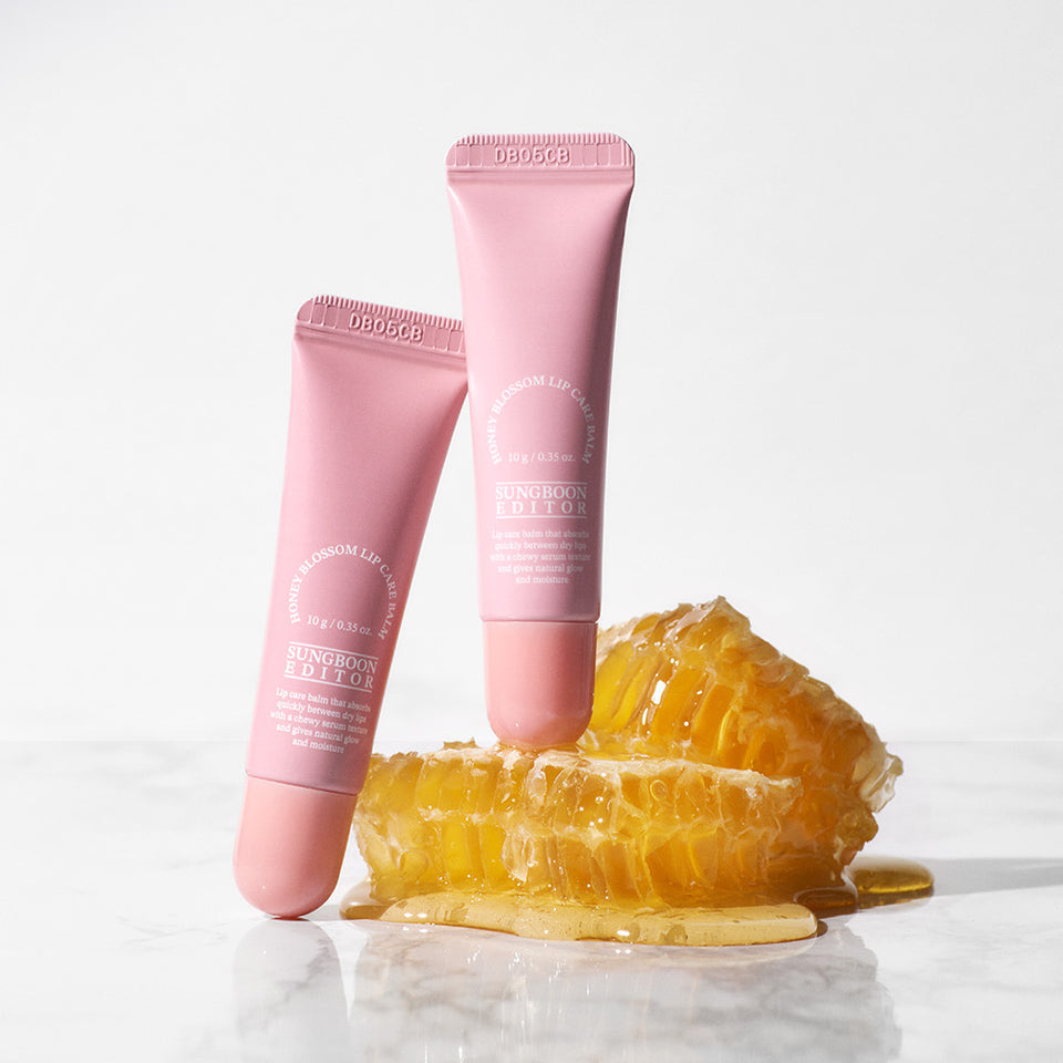 SUNGBOON EDITOR Honey Blossom Lip Care Balm tubes on honeycomb, maintaining moisture and smoothness for lips.