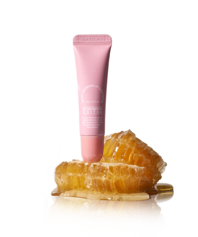SUNGBOON EDITOR Honey Blossom Lip Care Balm displayed with honeycomb for nourishing lip treatment.