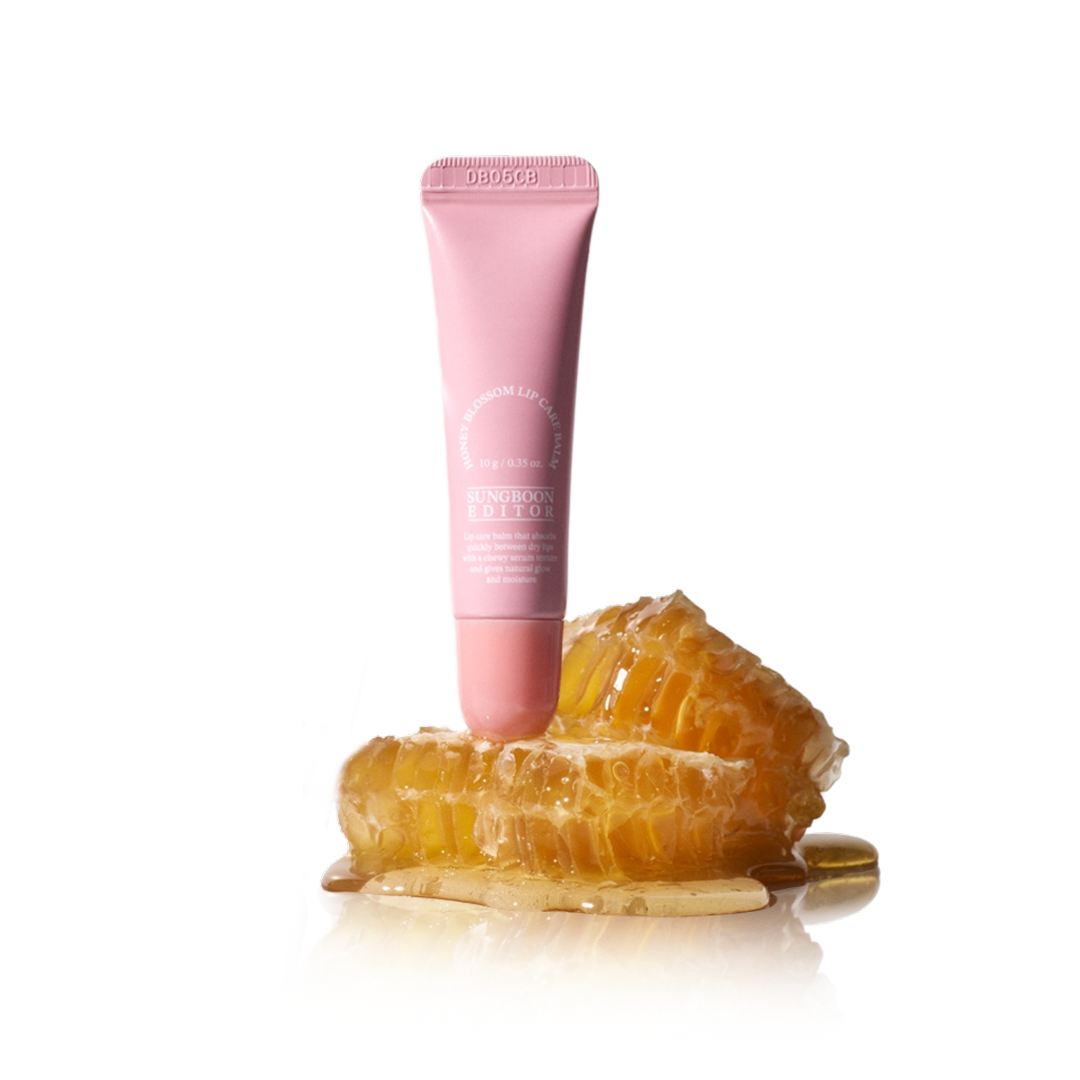 SUNGBOON EDITOR Honey Blossom Lip Care Balm displayed with honeycomb for nourishing lip treatment.