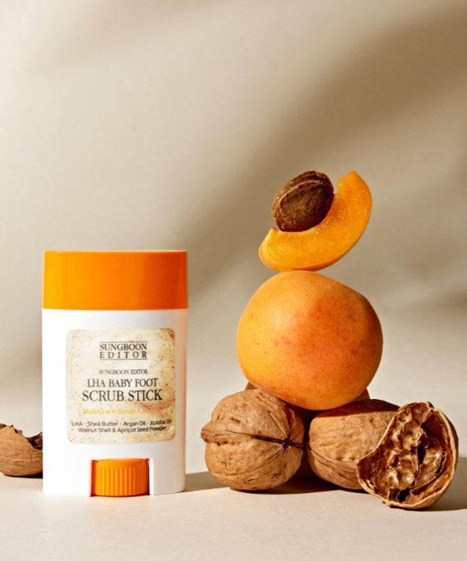 SUNGBOON EDITOR Laha Baby Foot Scrub Stick with peach and walnut, exfoliating skincare product display