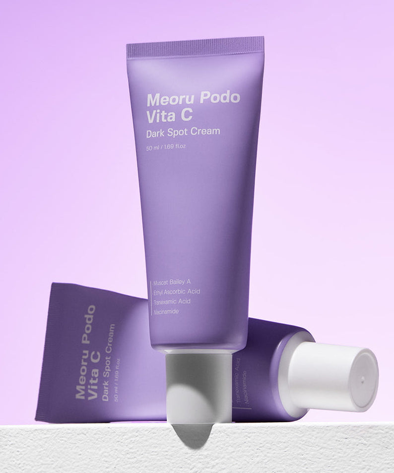 SUNGBOON EDITOR Meoru Podo Vita C Dark Spot Cream 50ml in purple packaging on a light purple background