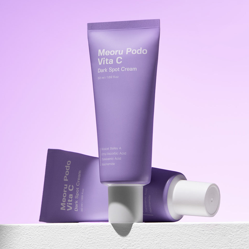 SUNGBOON EDITOR Meoru Podo Vita C Dark Spot Cream 50ml in purple packaging on a light purple background