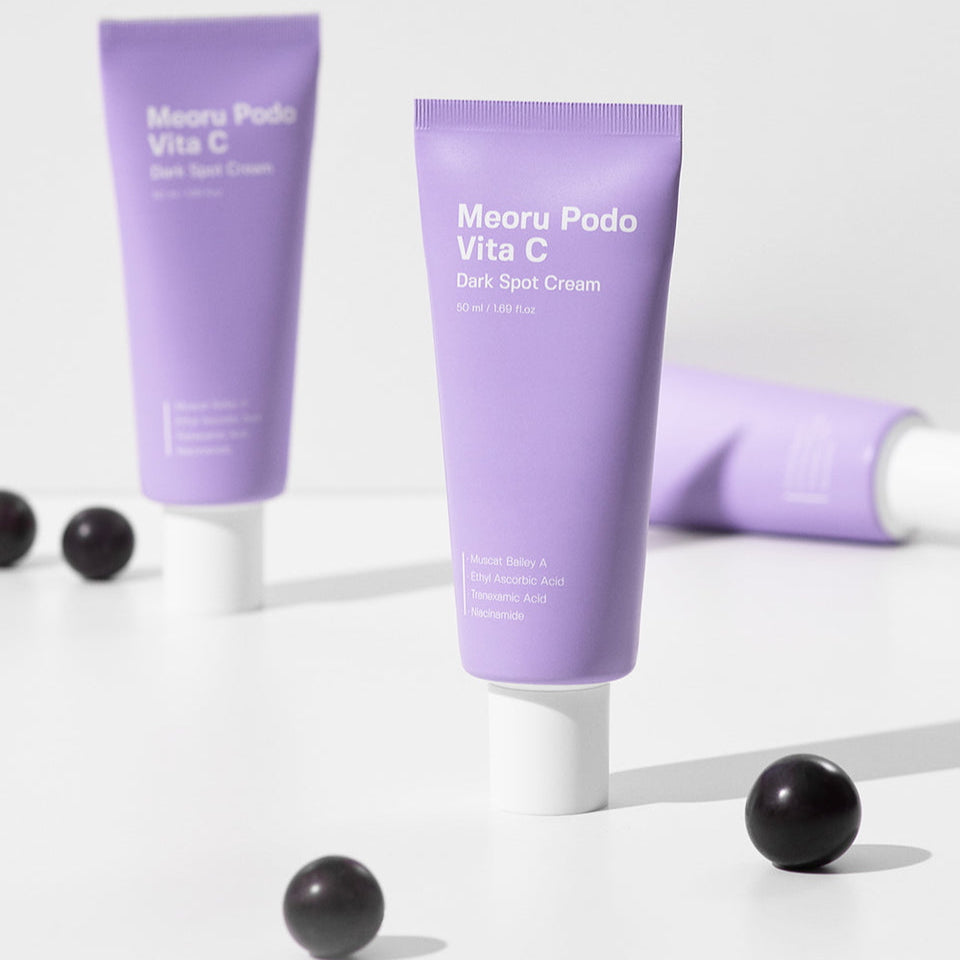 SUNGBOON EDITOR Meoru Podo Vita C Dark Spot Cream 50ml, anti-dark spot skincare product in purple tube packaging, on light background.