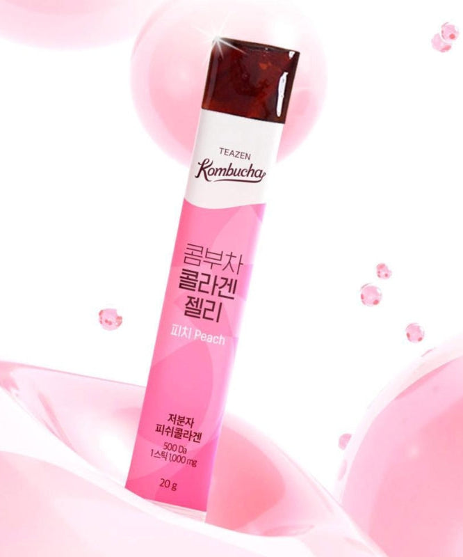 TEAZEN Kombucha Collagen Jelly Peach 14 Sticks in pink packaging, showcasing refreshing peach flavor, against a light pink background.
