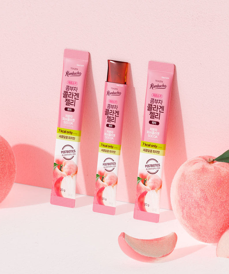 TEAZEN Kombucha Collagen Jelly Peach 14 Sticks on display with fresh peach background