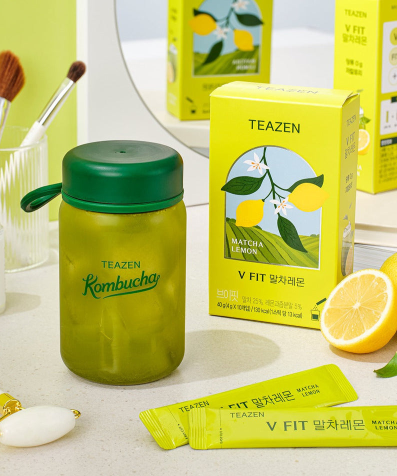 TEAZEN V-Fit Matcha Lemon 10 Sticks product display with refreshing drink, packaging, and lemon slices on a clean countertop.