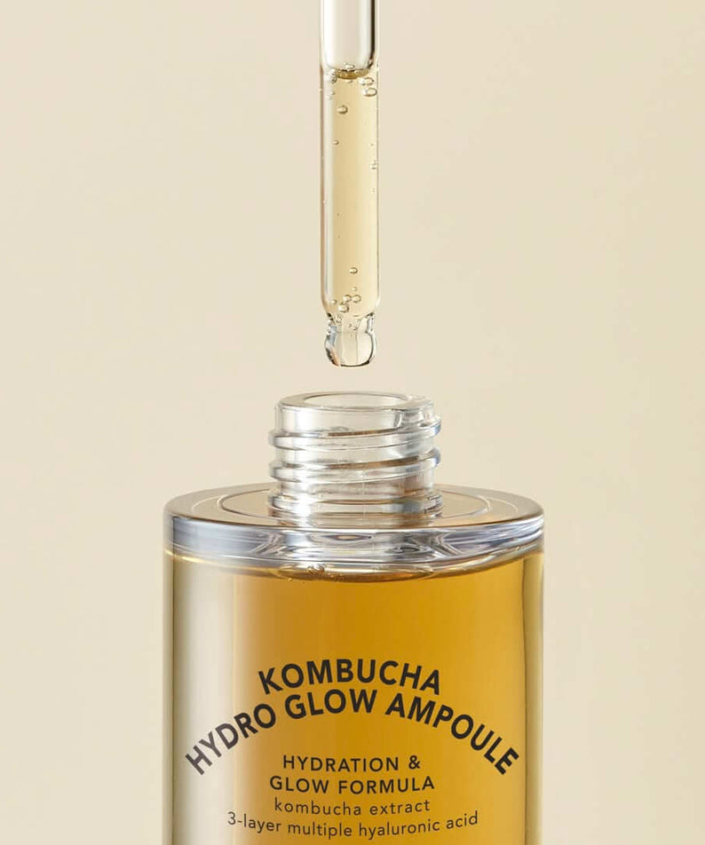 T'ELSE Kombucha Hydro Glow Ampoule 30ml with dropper applying serum, hydration and glow formula.