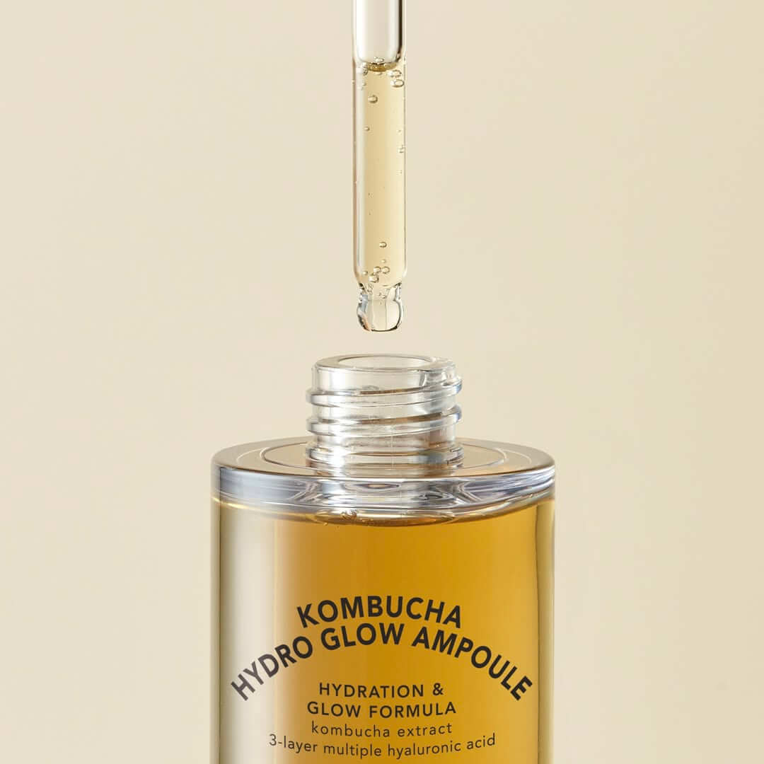 T'ELSE Kombucha Hydro Glow Ampoule 30ml with dropper applying serum, hydration and glow formula.