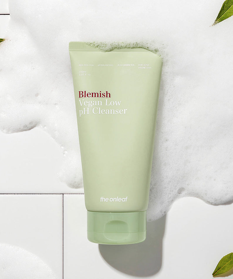 THE ONLEAF Blemish Vegan Low pH Cleanser 150ml in a foam background for skincare