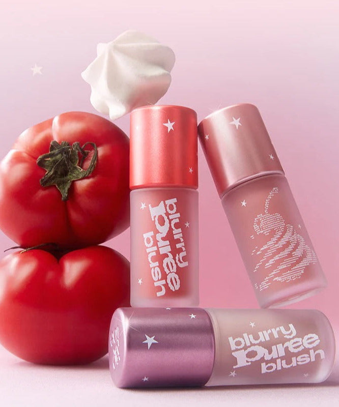 TIP TOE Blurry Puree Blusher with vibrant colors and tomato-inspired design against a pink background.