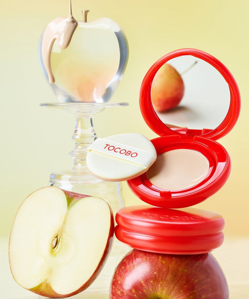 TOCOBO Apple Dewy Fit Cushion in a vibrant red compact with apples and dewy apple visual, highlighting its fresh and glowing finish.