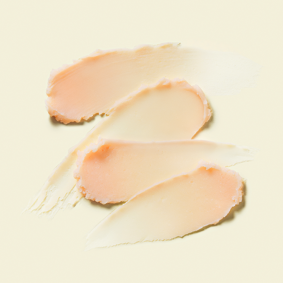 Texture of TOCOBO Vita Airy Sun Primer 35ml swatches in creamy shades, showcasing product consistency and finish.