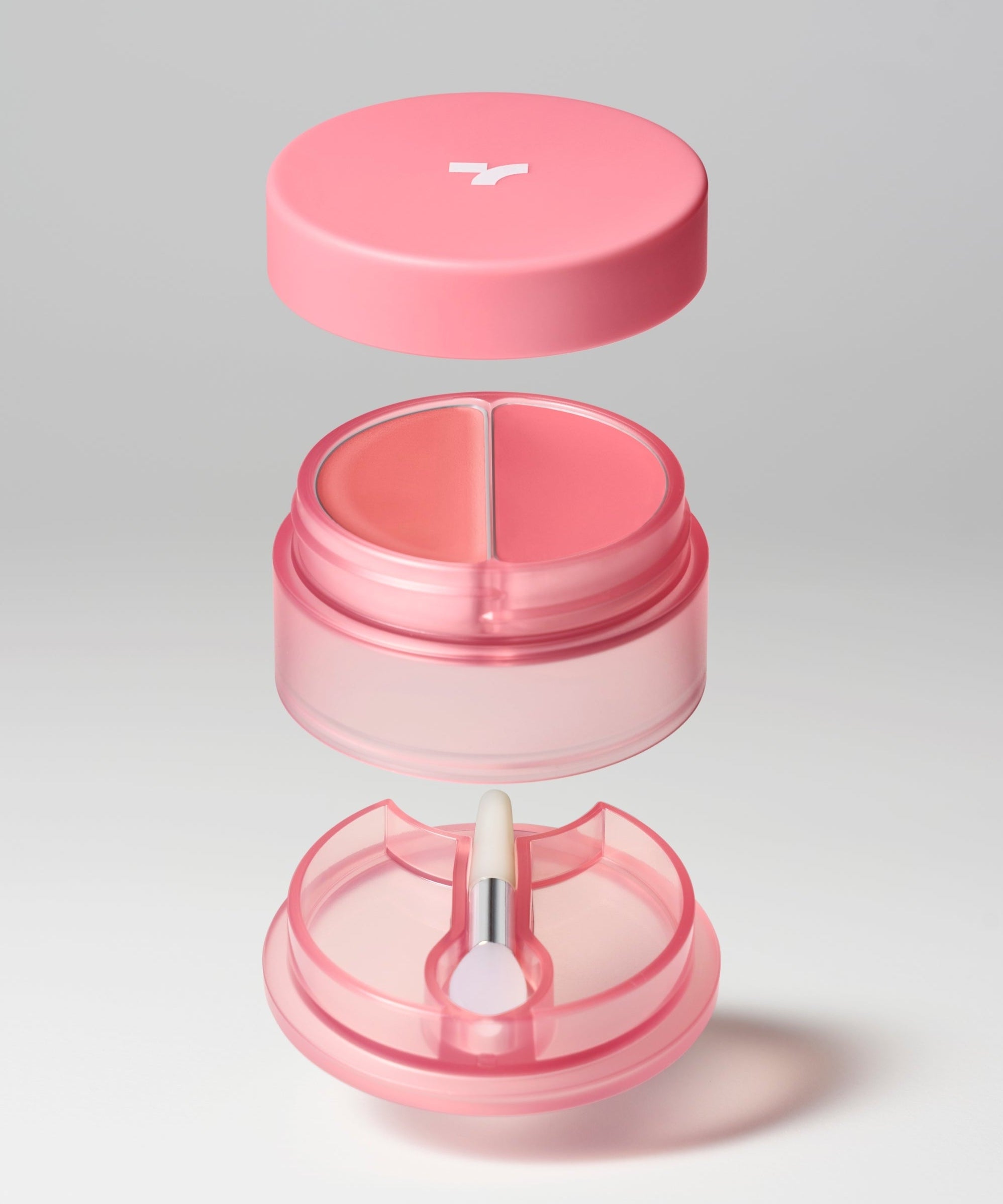 Open TONY MOLY Cheek Tone Lip & Cheek Duo Balm container showing pink shades and applicator