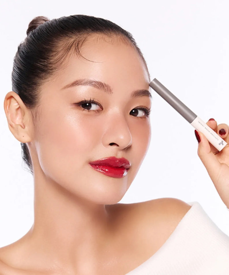 Model showcasing TONY MOLY Eye Tone Skinny Brow Mascara for perfectly defined brows.