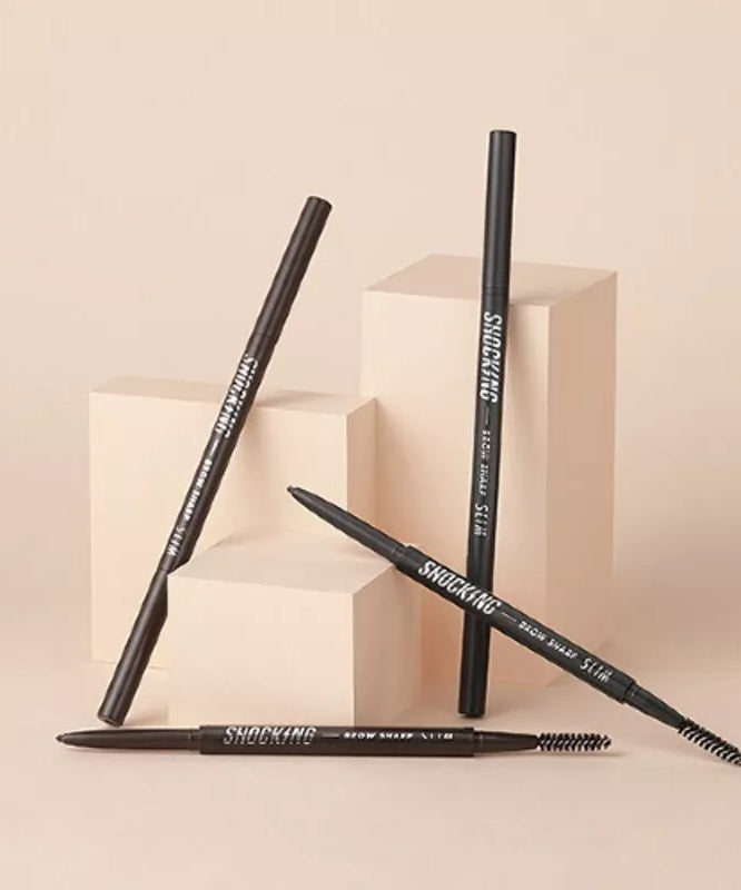 TONY MOLY The Shocking Vegan Brow Sharp Slim pencils displayed on beige background.