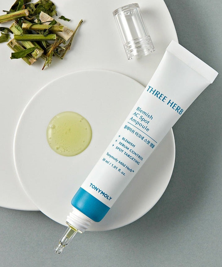 TONYMOLY Blemish Acne Spot Ampoule 30ml on a plate with herbs, skincare serum for blemish control