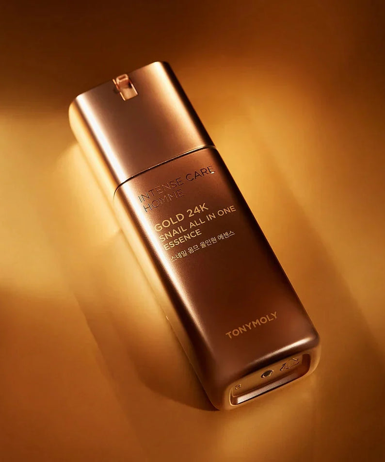 TONYMOLY Intense Care Gold 24K Snail Homme All-in-One Essence 130ml bottle on gold background for Gentleman Korea, Korean men’s skincare product