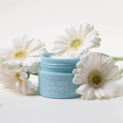 TONYMOLY Pure Dew Tea Tree & Yuja C Cream 50ml with white flowers