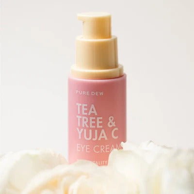 TONYMOLY Pure Dew Tea Tree & Yuzu Seed Vitality Eye Cream 30ml bottle with flowers for brightening and hydration