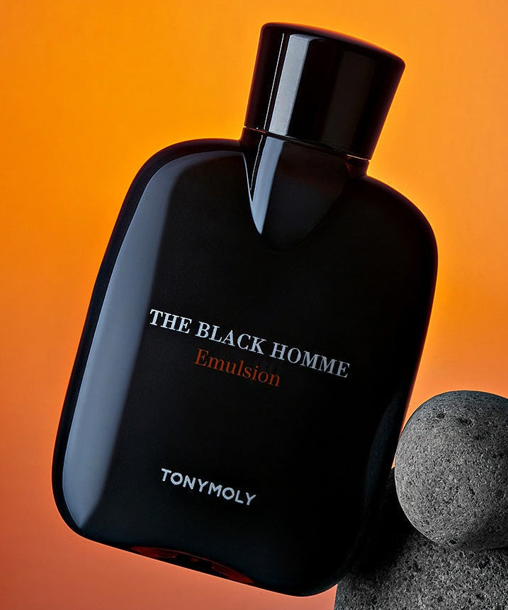TONYMOLY The Black Homme Emulsion 160ml - Gentleman Korea product shot of black emulsion bottle on orange background for men’s skincare