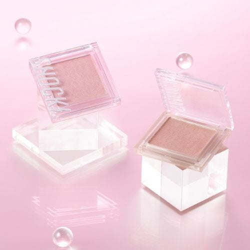 TONYMOLY The Shocking Bear Highlighter 4g in pink packaging on pastel background