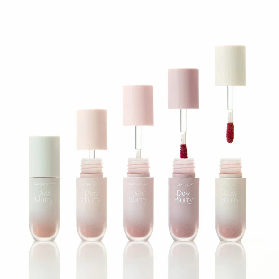 TOO COOL FOR SCHOOL Dew Blurry Tint lip product collection with applicators shown open and closed, elegant packaging on white background.