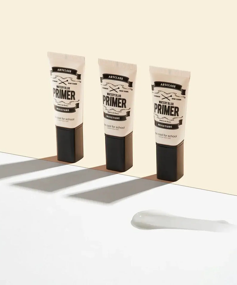 TOO COOL FOR SCHOOL Watery Blur primer tubes with cream on beige background