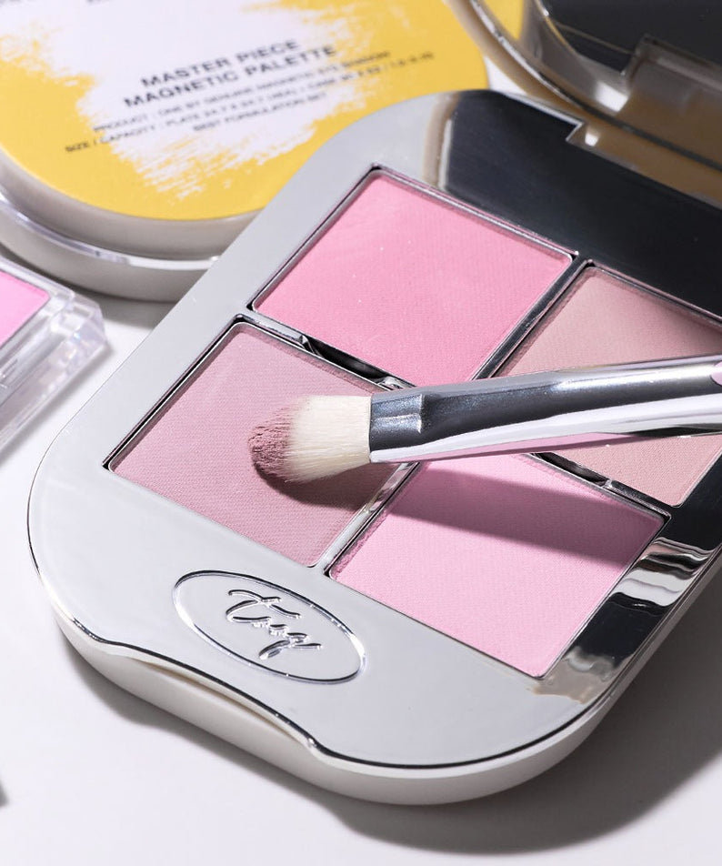 TOOQ Master Piece Face Shadow Palette showcasing pink shades and brush, ideal for enhancing natural beauty and makeup artistry.