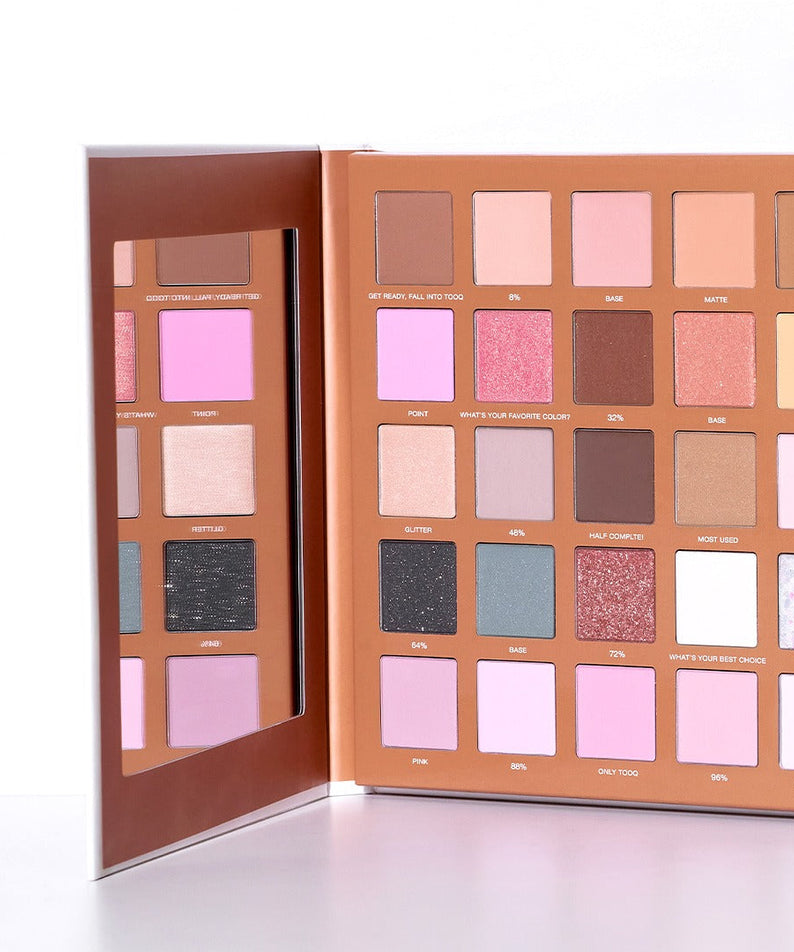 TOOQ One by Genuine Magnetic Shadow 25-Color Palette with vibrant shades and mirror.