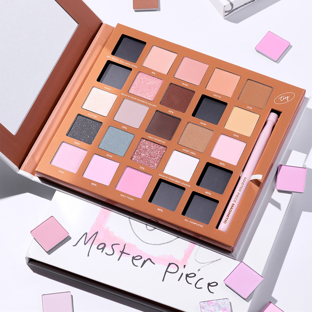 TOOQ One by Genuine Magnetic Shadow 25-Color Palette showcasing vibrant eyeshadow shades in an open palette with brush.