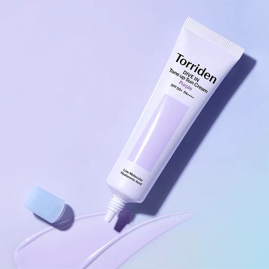TORRIDEN Dive In Tone Up Sun Cream Purple 50+PA++++ 60ml tube displayed on a purple background.