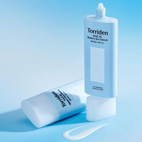 TORRIDEN Dive In Watery Sun Serum SPF50+PA++++ 50ml bottle with serum spill on blue background