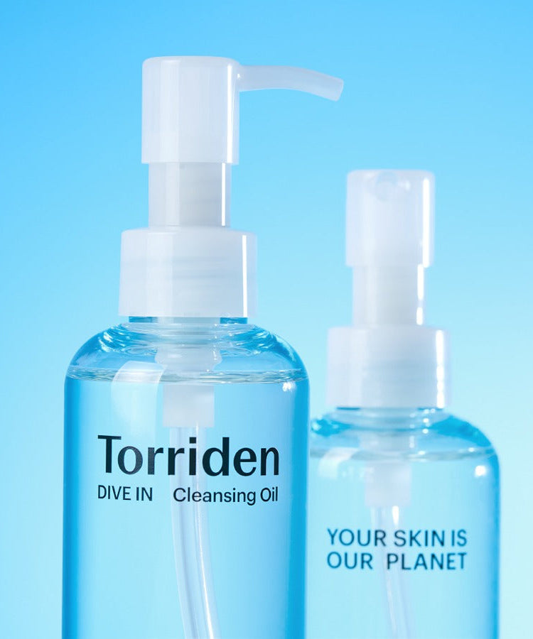 TORRIDEN Dive in Low Molecular Hyaluronic Acid Cleansing Oil 200ml featured in sleek, blue-toned packaging against a light blue background.