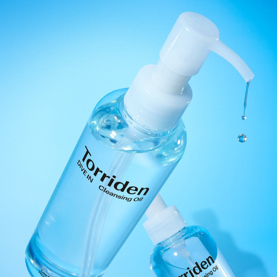 TORRIDEN Dive in Low Molecular Hyaluronic Acid Cleansing Oil 200ml product bottle with dispenser on blue background