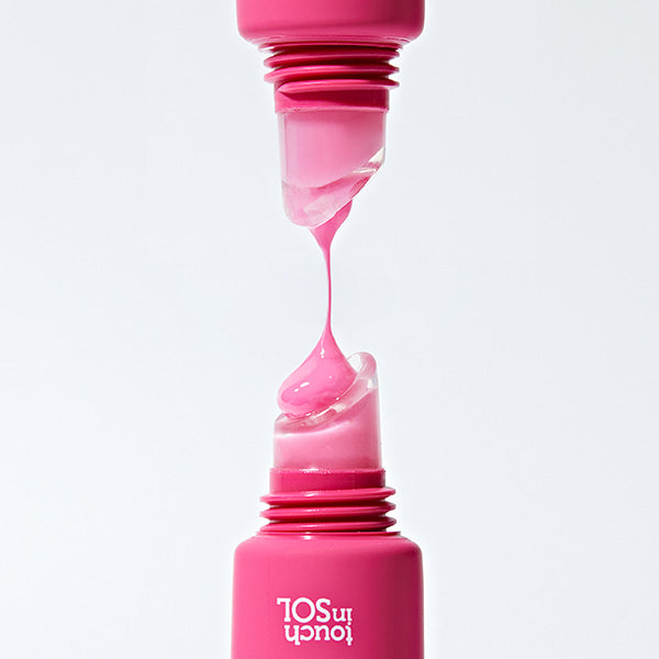 TOUCH IN SOL Pretty FIlter Lip Plumping Mask in pink container showcasing product texture.