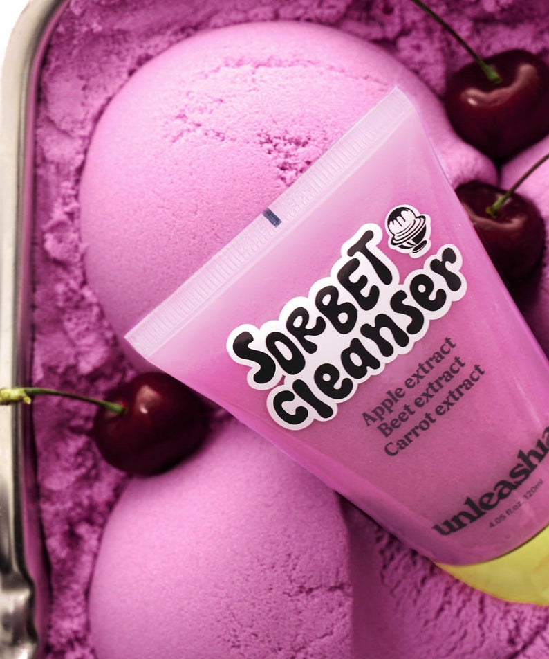 UNLEASHIA ABC Sorbat Facial Cleanser 120ml with cherry-infused background showcasing apple, beet, and carrot extracts.
