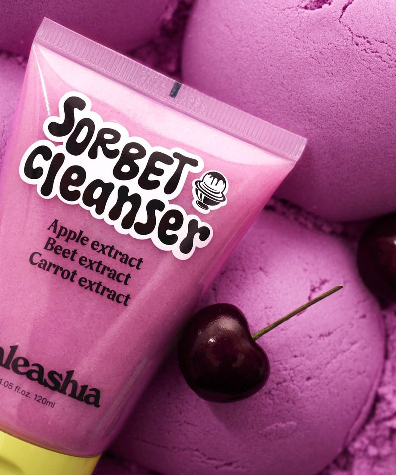UNLEASHIA ABC Sorbat Facial Cleanser 120ml tube next to cherries and pink spheres
