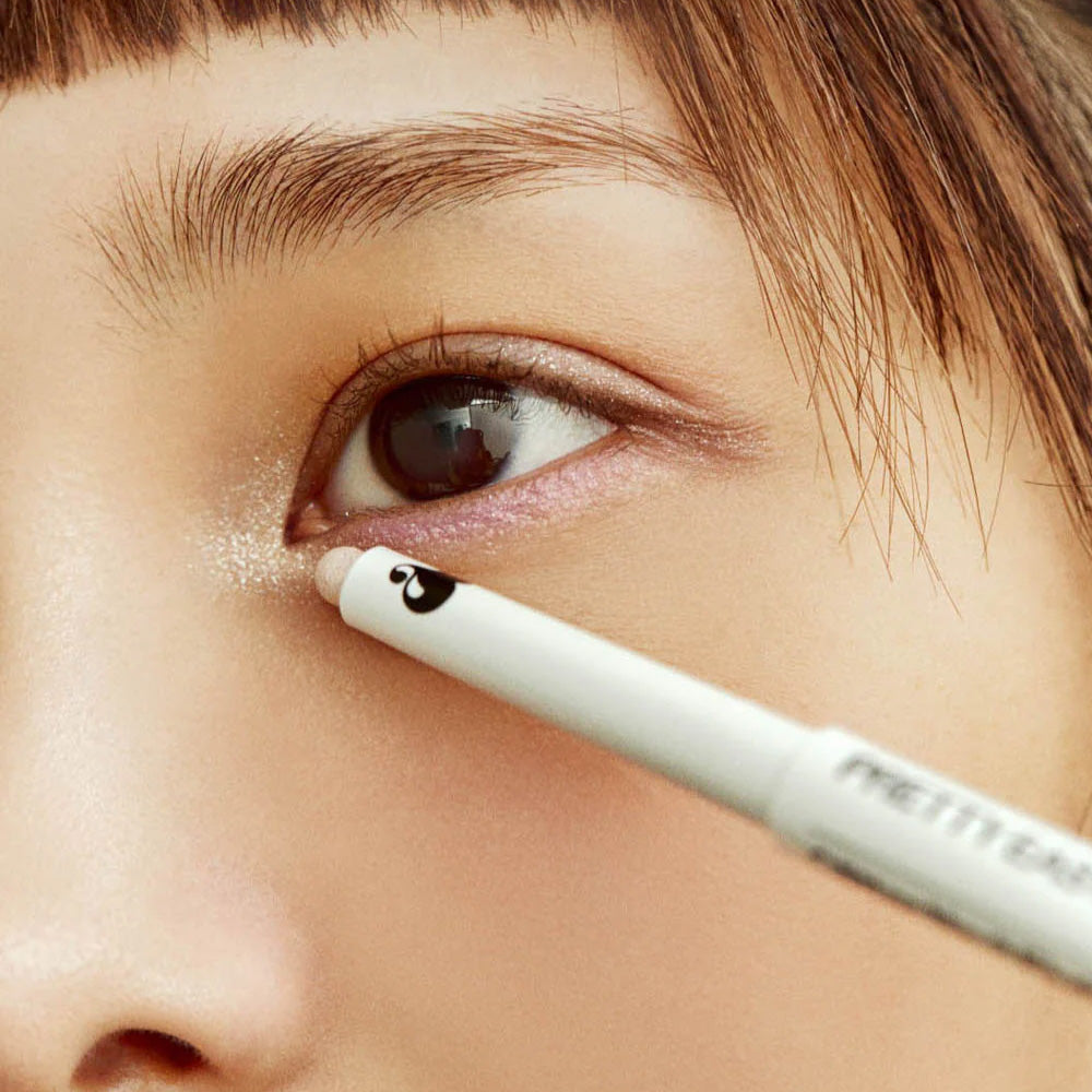 Close-up of eye makeup application with UNLEASHIA Pretty Easy Glitter Stick