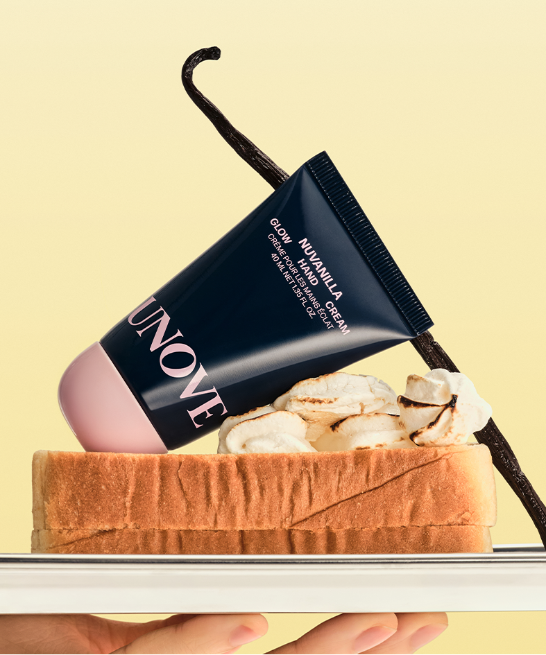 UNOVE Glow Hand Cream 40ml resting on toast with marshmallows and vanilla stick, showcasing its luxurious and moisturizing properties.