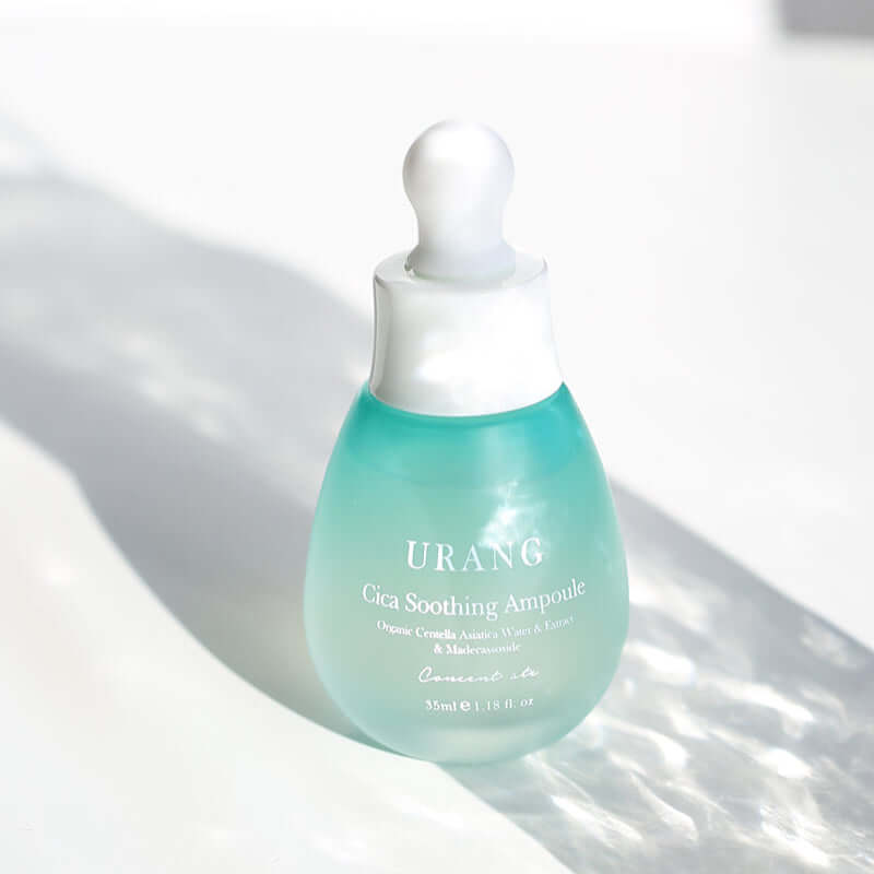 URANG Cica Soothing Ampoule bottle with dropper in natural lighting.
