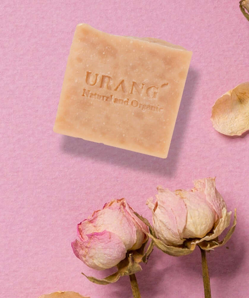 URANG Rose Garden CP Handmade Soap with dried roses on a pink background