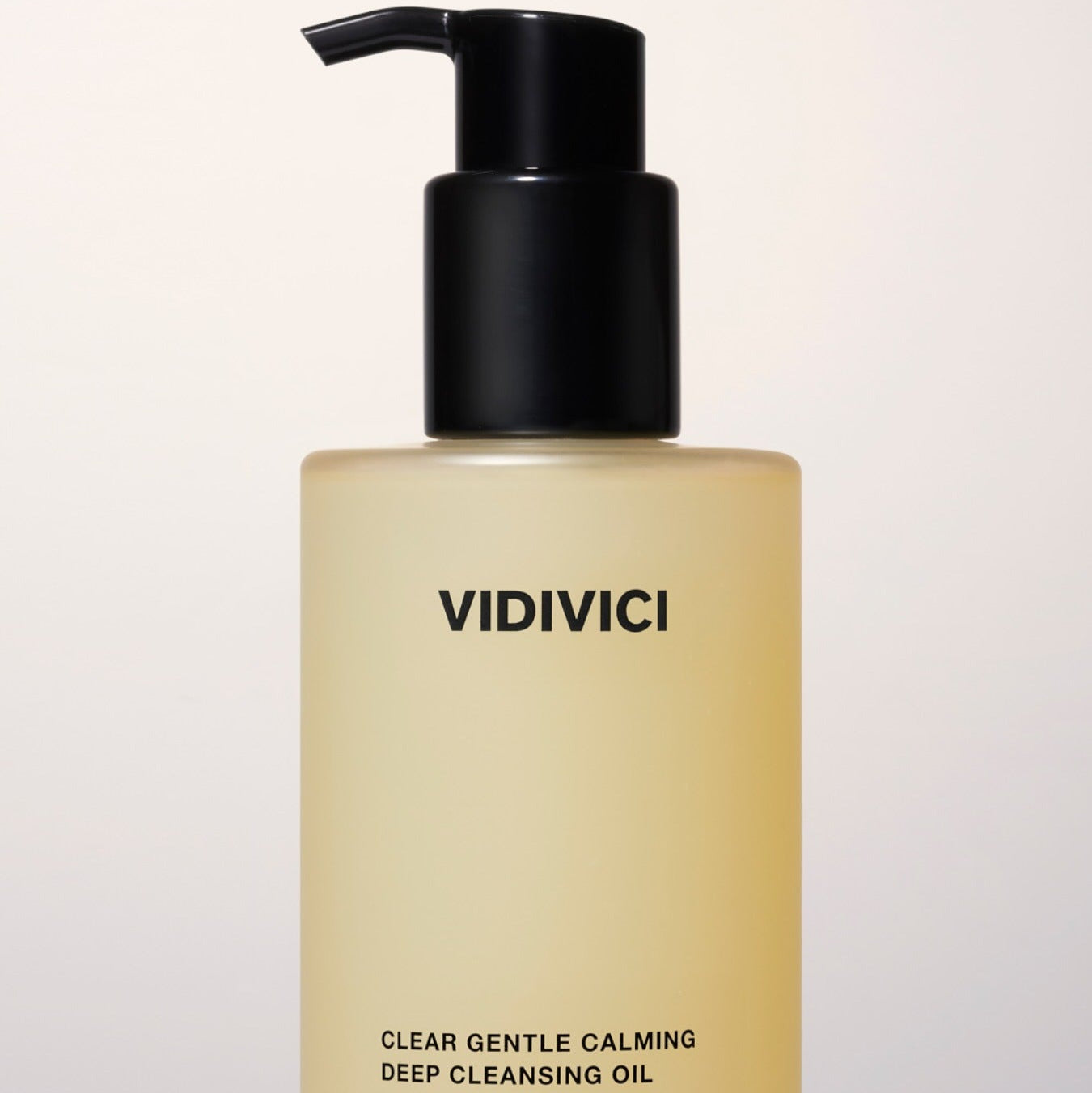 VIDIVICI Clear Gentle Calming Deep Oil 300ml bottle with pump lid against white background.