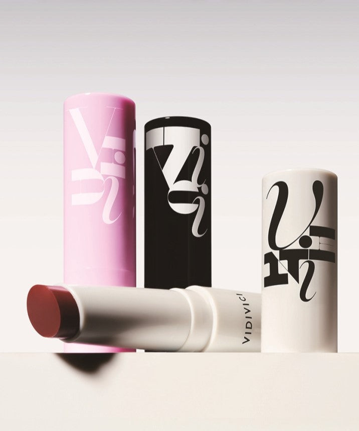 VIDIVICI The Melting Balm in sleek packaging with three elegant designs showcasing the product's luxurious appeal.