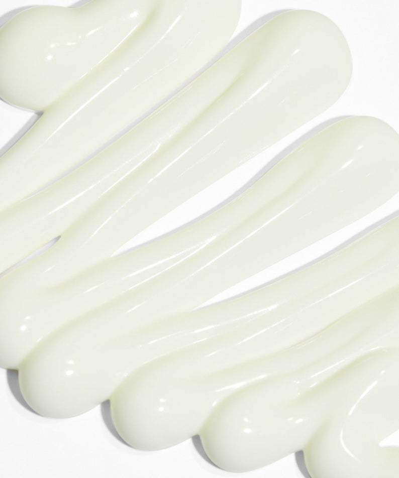 Texture of VT COSMETIC Airy Sunscreen 50ml swirled on a surface.