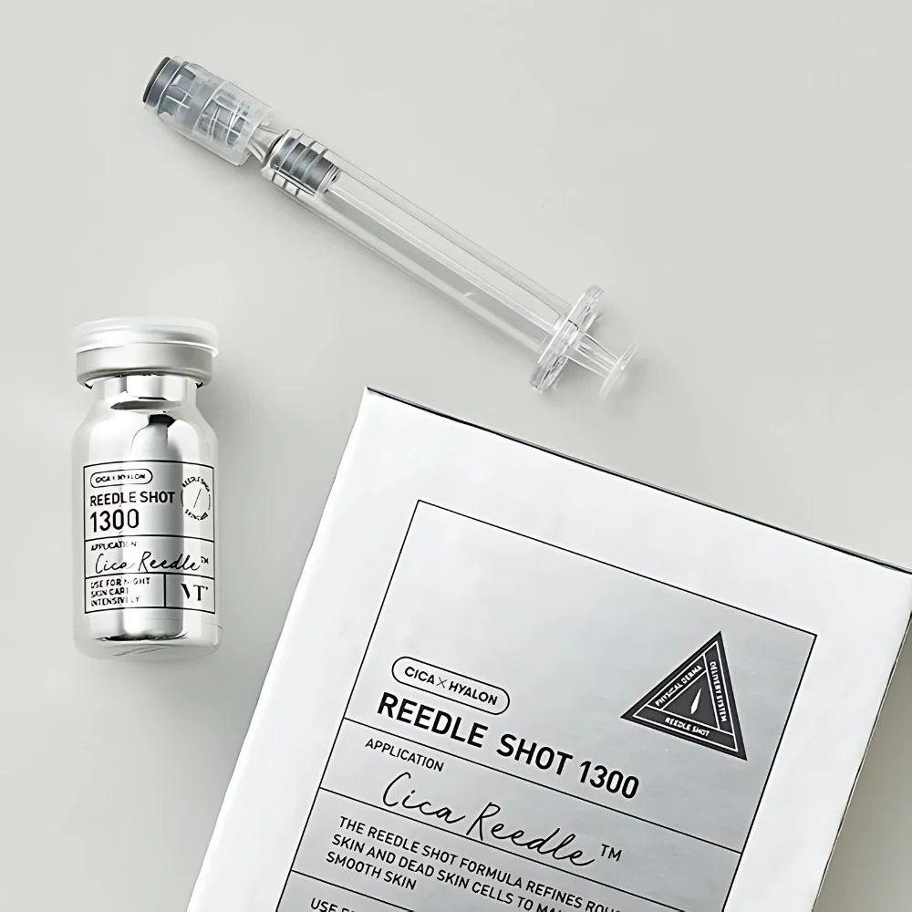VT COSMETIC Riddle Shot 1300 8ml skincare product with packaging, syringe, and vial displayed on a neutral background