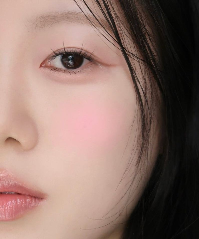 Model wearing WAKE MAKE Sheer Breeze Blusher 5g, highlighting a natural rosy cheek look.
